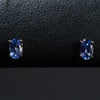 Ladies Oval Cut Tanzanite Color Stud Earrings / 14 Kt W - Anderson Jewelers 