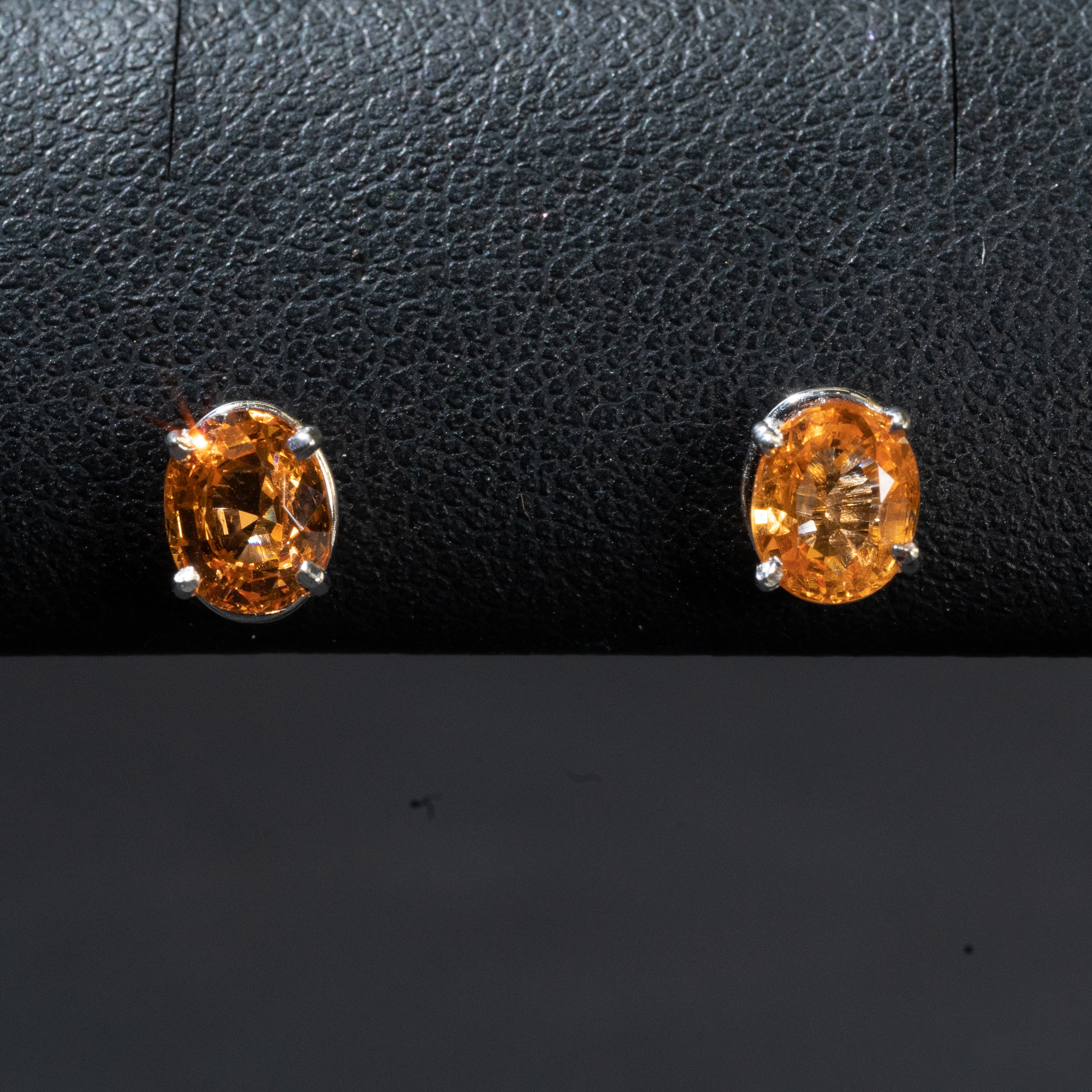 Ladies Oval Cut Garnet Color Stud Earrings / 14 Kt W - Anderson Jewelers 